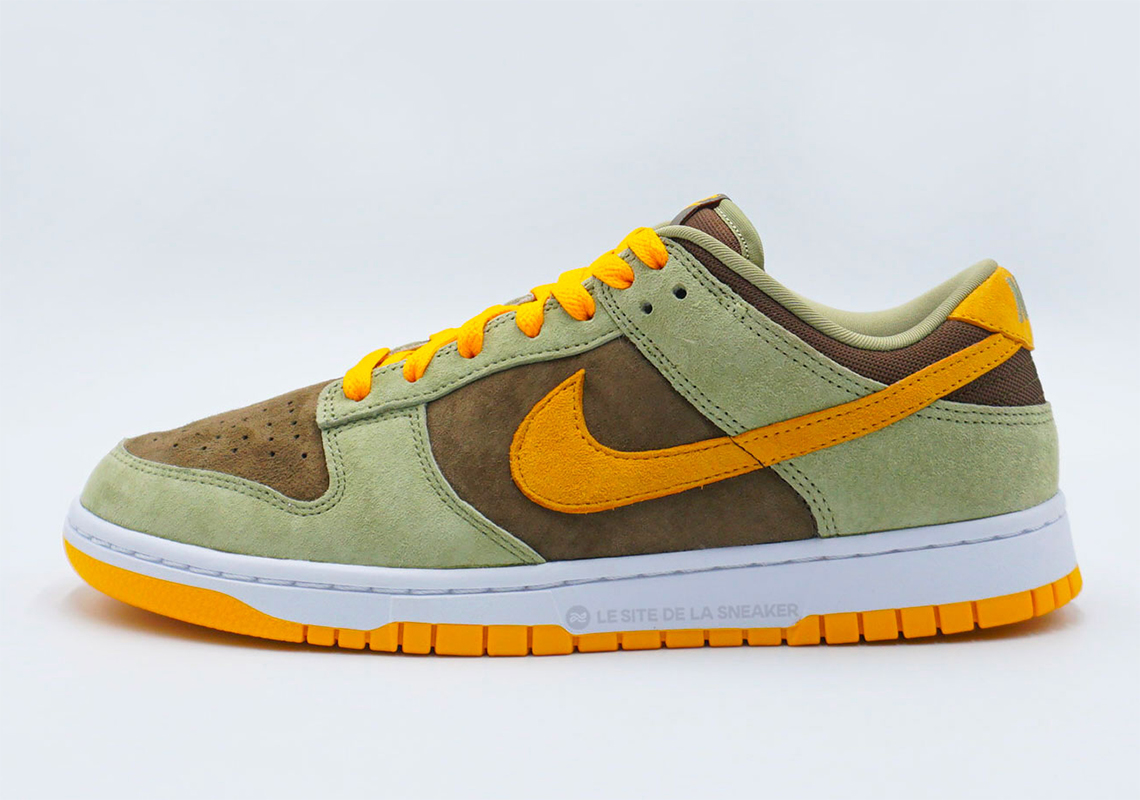 Nike Expands The “Ugly Dunkling” Look With The Dunk Low In Olive And Gold